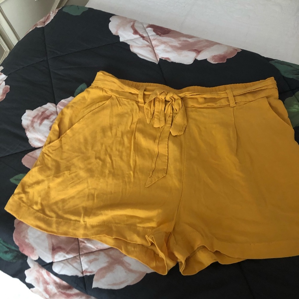 Soft mustard colored shorts